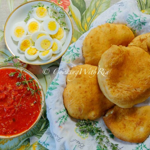 boiled tomato choka, fried bake, boiled egg