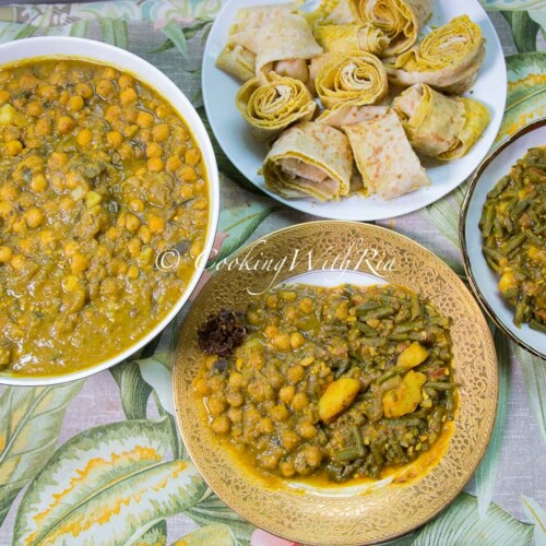 Curry bodi and aloo served hot with dhalpuri roti — a vegan Trinidadian curry perfect for Diwali or Sunday lunch.