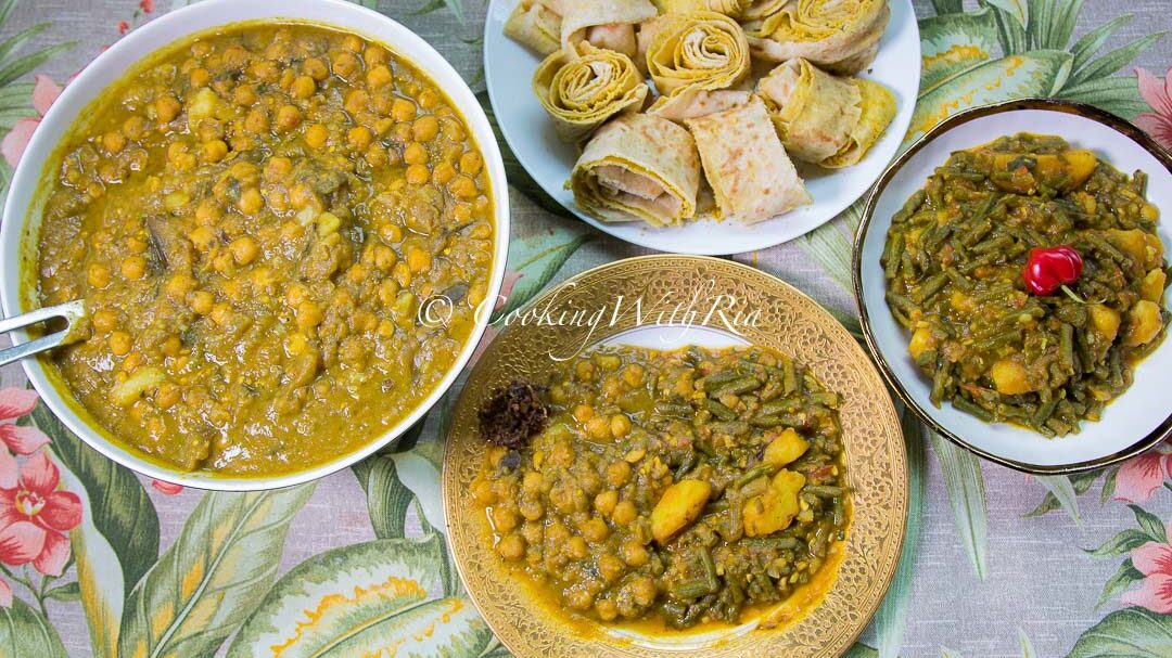 Curry bodi and aloo served hot with dhalpuri roti — a vegan Trinidadian curry perfect for Diwali or Sunday lunch.