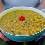 Trinidad curry channa with eggplant served in bowl