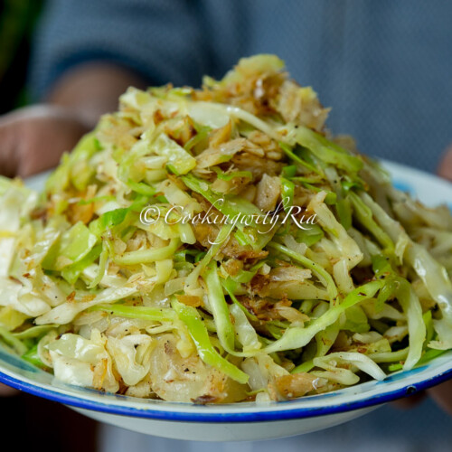 Cabbage with saltfish Caribbean stir fry with tender cabbage and golden salted cod