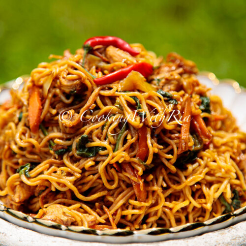 Close-up of homemade Easy Spicy Chow Mein Recipe with chewy noodles and fresh vegetables